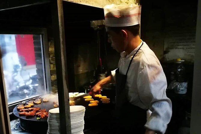Authentic Old Beijing Hutong Food and Beer Private Tour - What You’ll Eat: Hot Pot, Noodles, Wraps, and BBQ-Style Bites