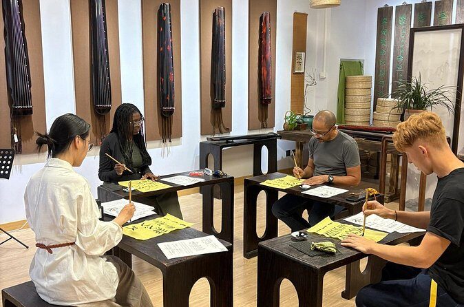 Beijing Culture: Tea Ceremony, Heritage Instrument & Calligraphy - Traditional outfit rental: photos are a bonus, not the point