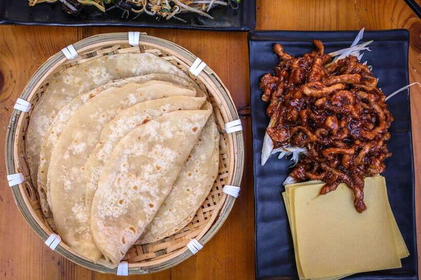 Beijing: Hidden Gems Guided Food Tour with Beer and Tastings - Beijing noodles in a hole-in-the-wall courtyard