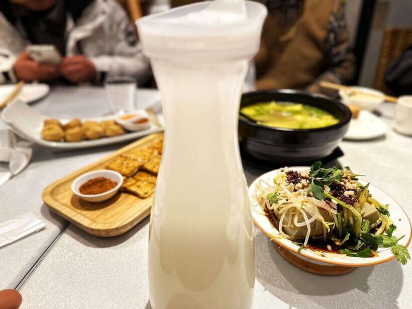 Beijing Hutong Food Crawl Delights: Peking duck, Hotpot&More - Peking duck with live carving: crispy skin, tender meat, and how to eat it
