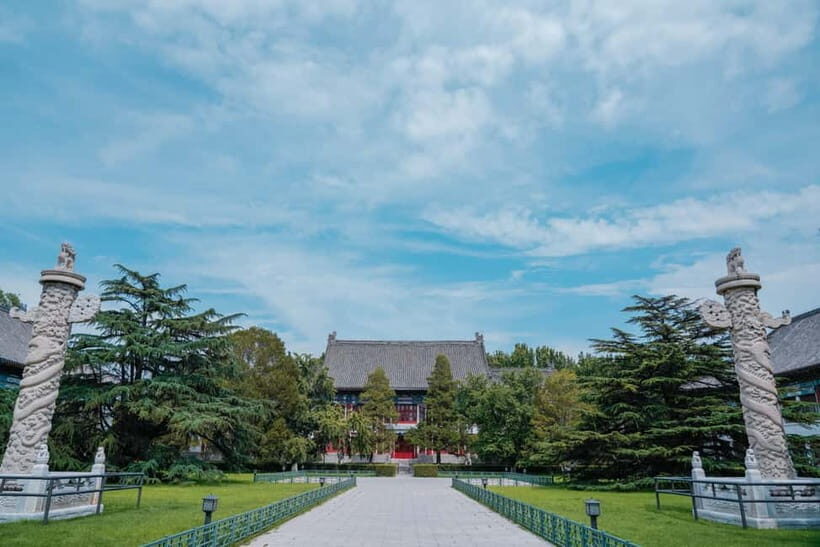 Beijing: Peking University Campus Guided Walking Tour - Bell Pavilion, Hua Biao, and Qilin statues: reading campus details