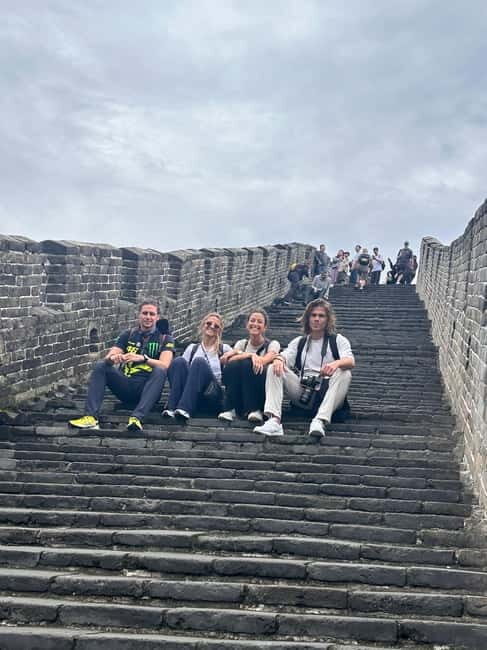 Morning Bus Transfer to Mutianyu Great Wall + Entry Ticket - Guides in Chinese and English: what you’ll get beyond directions