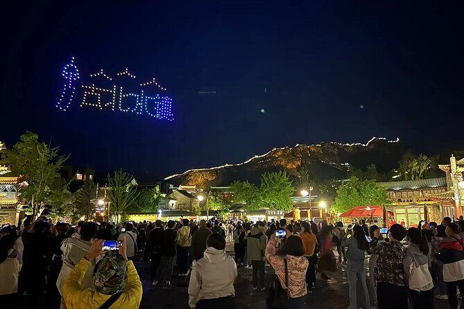 Private Evening Tour to Simatai Great Wall and Gubei Water Town - Gubei Water Town at night: fountains, light shows, and photo-friendly wandering