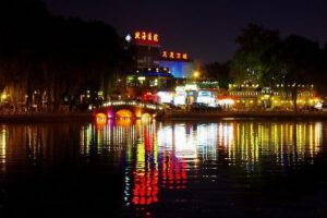 Private Night Tour: Discover Beijing in Bustling Lights - Olympic Park at night: the Bird’s Nest and Water Cube glow