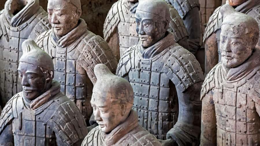 Xian: Bus Tour of Terracotta Warriors With Guide & Lunch - Pickup, coach rides, and what the day feels like